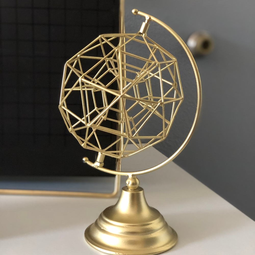 Gold spinning globe